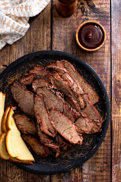 istock Sliced smoked brisket on a serving plate with toast 1968538054