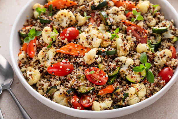istock Warm quinoa salad with roasted vegetables and fresh tomatoes 1968539109
