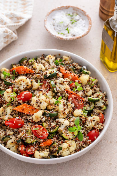 istock Warm quinoa salad with roasted vegetables and fresh tomatoes 1968539112