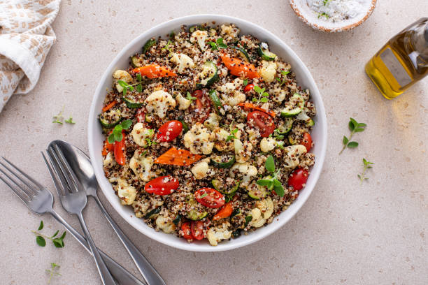 istock Warm quinoa salad with roasted vegetables and fresh tomatoes 1968539113