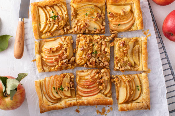 istock Puff pastry apple galette with pecan nuts and caramel syrup 1968539117