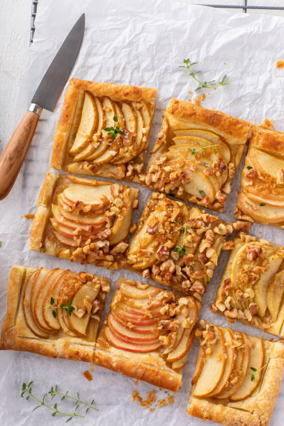 istock Puff pastry apple galette with pecan nuts and caramel syrup 1968539118