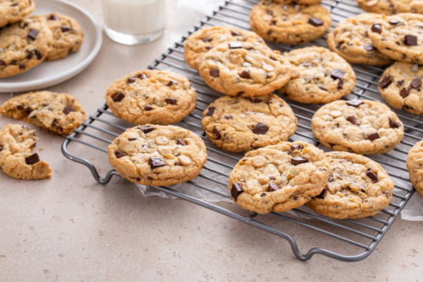istock Chocolate chip cookies on a cooling rack with flaky salt served with milk 1968539123