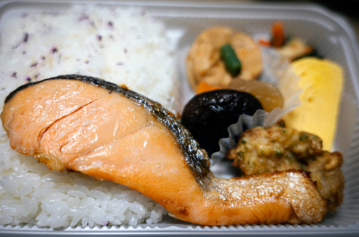 Bento culture is from Japan. It is a complete dish in a small box. Bento is usually filled with a main dish from the previous night (Could be leftover) and several more. Grilled Salmon Bento is one of the various bentos. It is easy to find at convenience stores and supermarket.