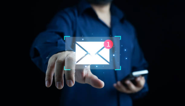 istock New email notification concept for business e-mail communication and digital marketing. Inbox receiving electronic message alert. business people touch on email in virtual screen. internet technology. 1968555805