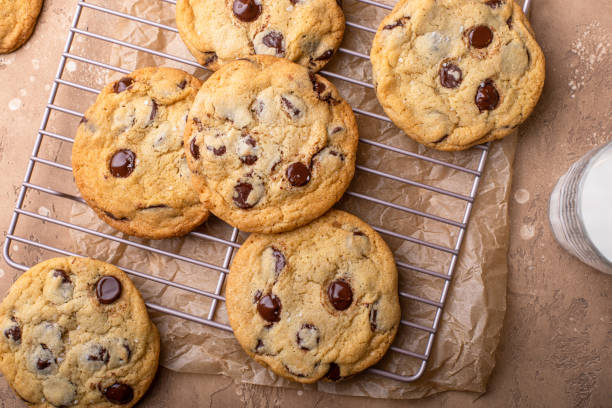istock Chocolate chip cookies freshly baked on a cooling rack 1968568436