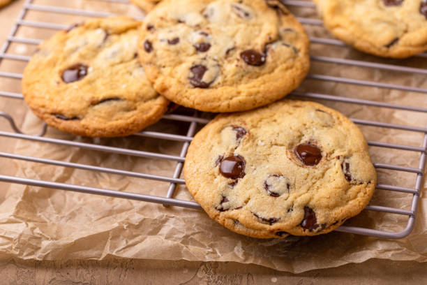 istock Chocolate chip cookies freshly baked on a cooling rack 1968568439
