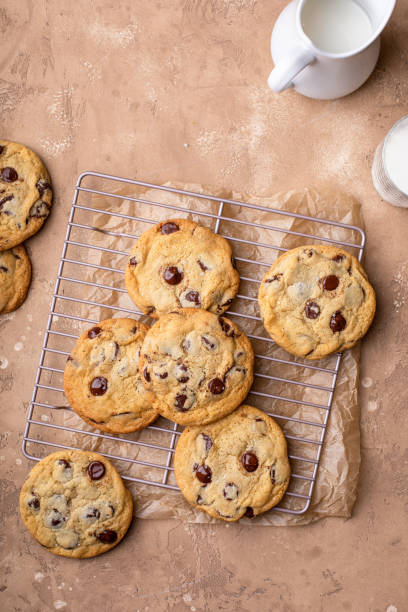 istock Chocolate chip cookies freshly baked on a cooling rack 1968568443