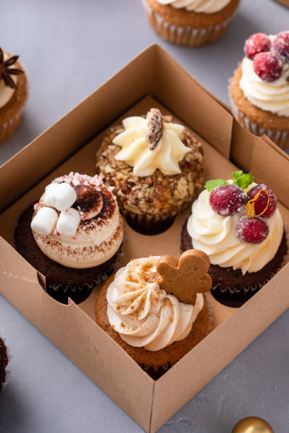 istock Variety of Christmas cupcakes in a gift box 1968568985