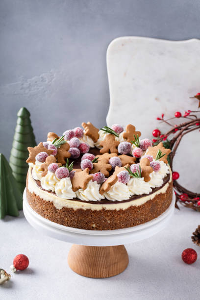 istock Festive Christmas cake idea, cheesecake decorated with gingerbread cookies and sugared cranberries 1968568991