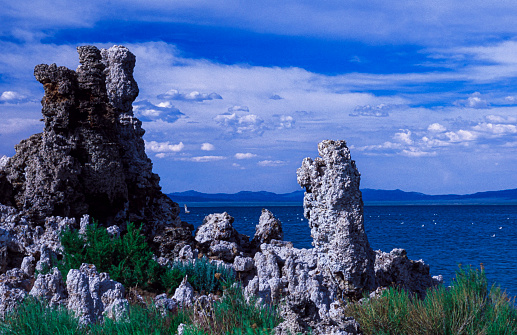 View of tufa formation on the bank of Mono Lake. Tufa is a variety of limestone formed when carbonate minerals precipitate out of water in unheated rivers or lakes.\n\nTaken at Mono Lake, California, USA
