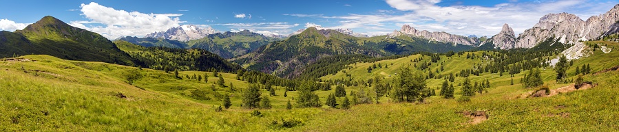 Beautiful vista of rocky dolomite mountains and coniferous forests near Cortina d´Ampezzo, Italy.