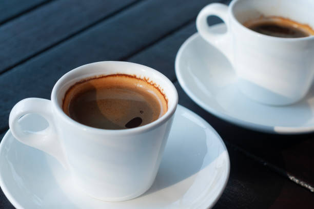 istock two single and double cups of espresso coffee 1968701156