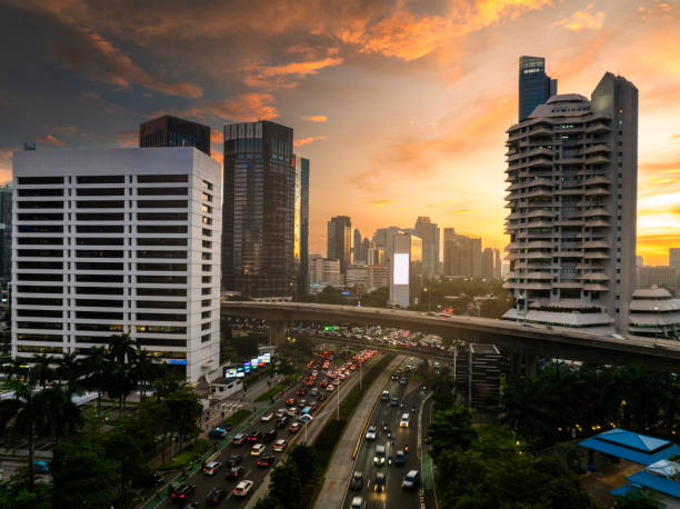 istock the panoramic view of jakarta city with beautiful sunset using drone 1968754893