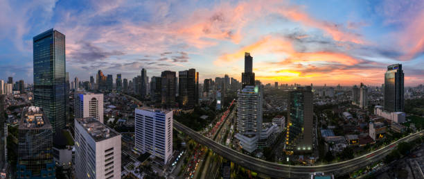 istock the panoramic view of jakarta city with beautiful sunset using drone 1968756957
