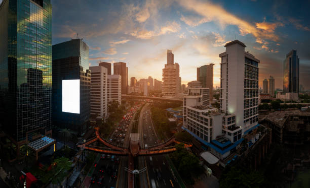 istock the panoramic view of jakarta city with beautiful sunset using drone 1968764083