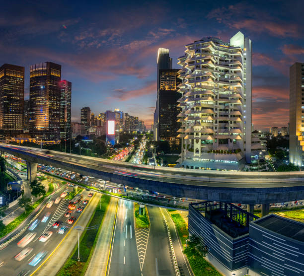 istock the panoramic view of jakarta city with beautiful sunset using drone 1968765707