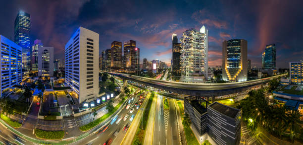 istock the panoramic view of jakarta city with beautiful sunset using drone 1968765882