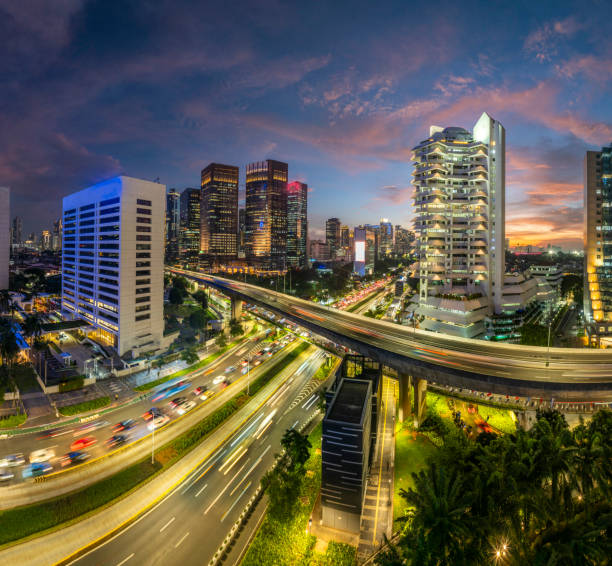 istock the panoramic view of jakarta city with beautiful sunset using drone 1968766266