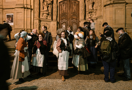 1st January 2024, San Sebastián, Basque Country, Spain: Local amateur choir in traditional Basque clothing singing in front of Saint Mary Church. San Sebastián is famous for its longest beach in Europe and incredible food culture.