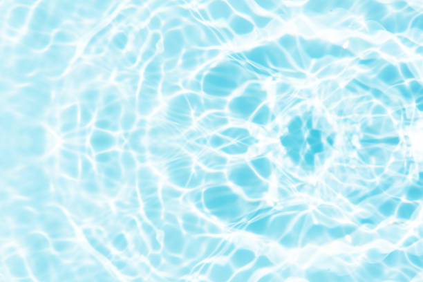 Abstract sunlight shadows blue background with flare and glare. Natural abstract aesthetic mockup with caustic effects for design and product presentation.