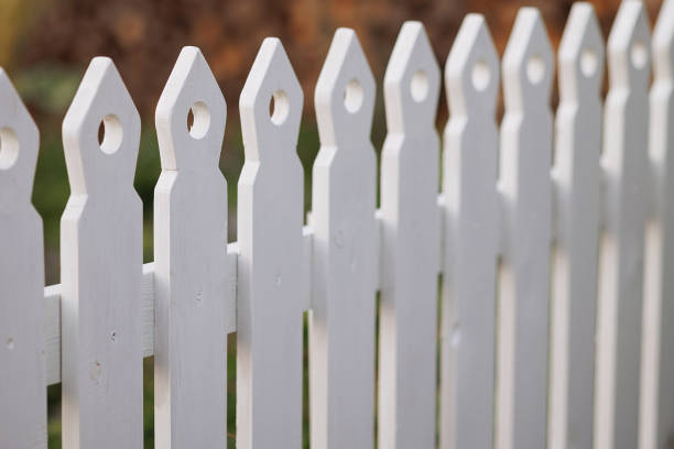 istock Detailed view of white picket fence 1968809943