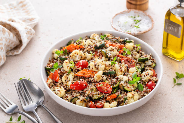 istock Warm quinoa salad with roasted vegetables and fresh tomatoes 1968814201