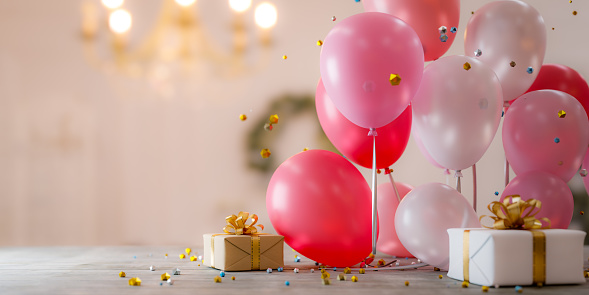 Celebration background with bright pink balloons and gift boxes.3d rendering