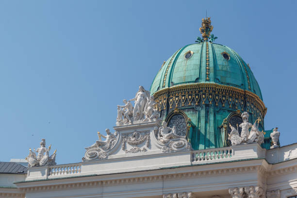 Vienna, Austria. June, 20 - 2013: Detail of the facade of the Hofburg palace in Vienna, Austria.An eagle and the dome
