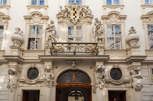 Vienna, Austria. June, 20 - 2013: Detail of the ornate facade of the Baroque city palace Neupauer-Breuer, Vienna, Austria