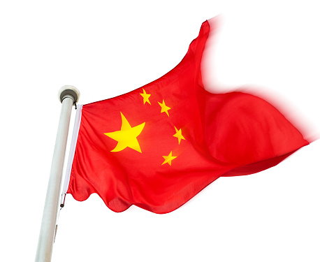 Chinese flag on pole waving in the wind against white background