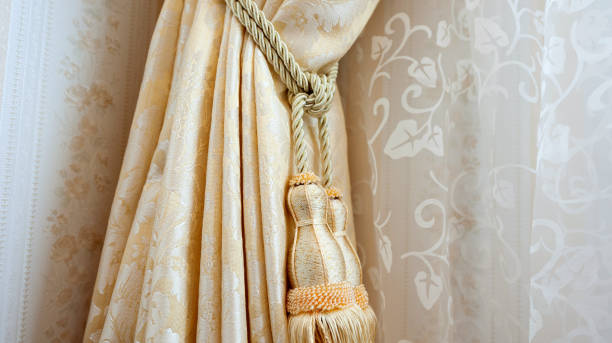 istock Curtain hold back by tassel 1968961293