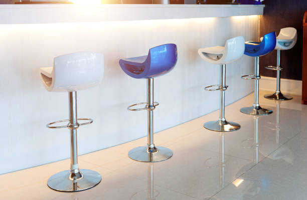 istock Blue and white bar chairs in a row 1968961813