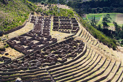 Peru South America Inca Village Ruins With Terrace Levels In Hill And Stone Walls