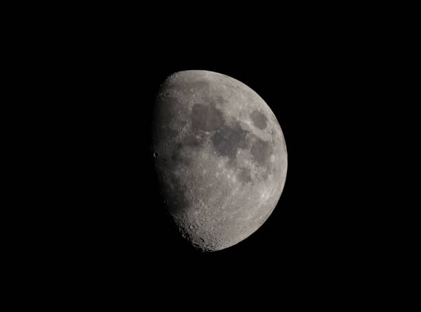 istock half waxing gibbous moon on night sky 1969008979