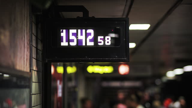 view of the digital clock in a subway