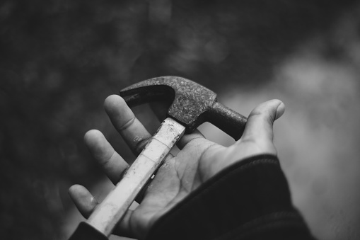 holding small hammer