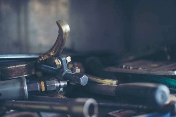 istock Heavy screw grungy rusted wrenches dirty screwdriver object. Industrial hardware set. Mechanic tools engineering equipment car auto repair shop with copy space. Blurred background mechanical service 1969065200