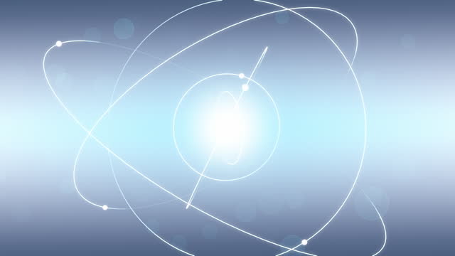 Atom particle structure on light blue background