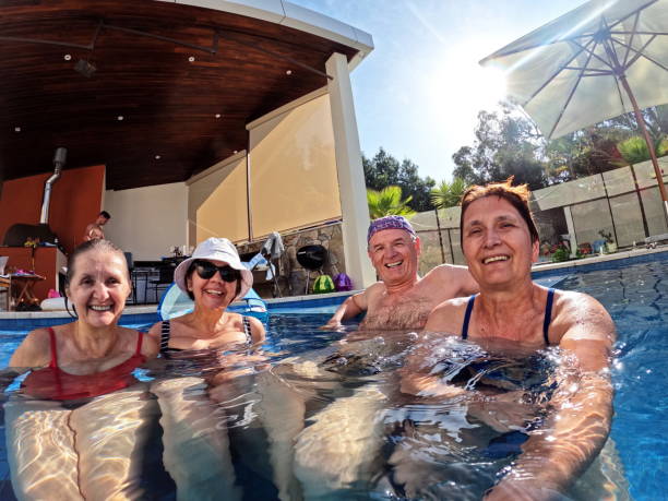 istock Senior people enjoying in the swimming pool 1969156687