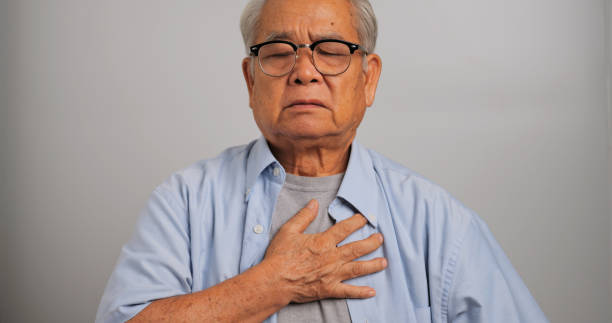 istock Asian old man has difficulty breathing. An elderly man has dyspnea. 1969207505