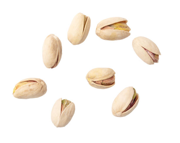 istock Fresh pistachios isolated on white background. Macro 1969226007