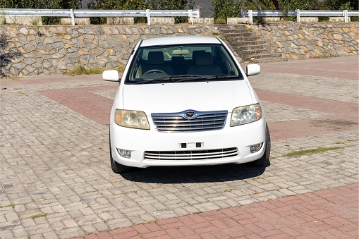 Front view of a toyota corolla cart on a sunny day
