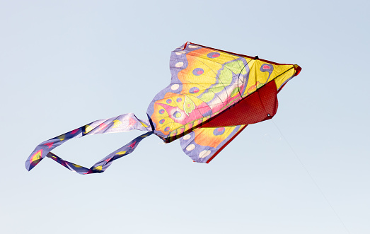 A kite in flight in the sky.
