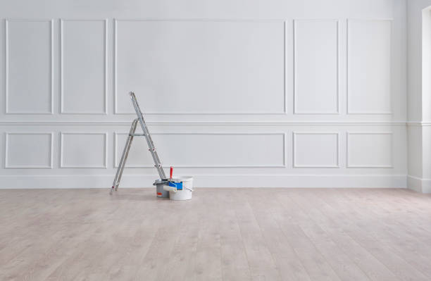 White classic wall, stairs, paint and brush, interior whitewash.