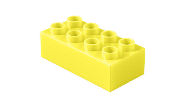 istock Lemon Plastic Toy Block Isolated on a White Background. 1969407677