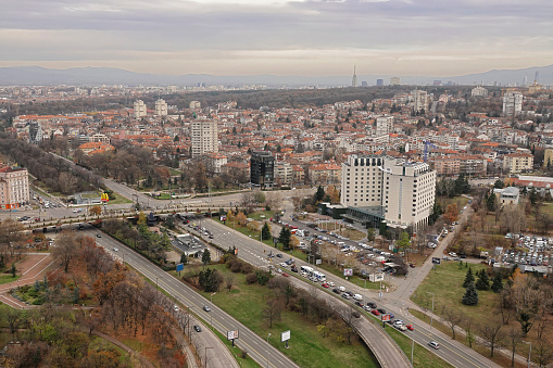 Sofia, Bulgaria – December 11, 2023: An aerial view of the Hilton Hotel in City center of Sofia in Bulgaria on a cloudy day