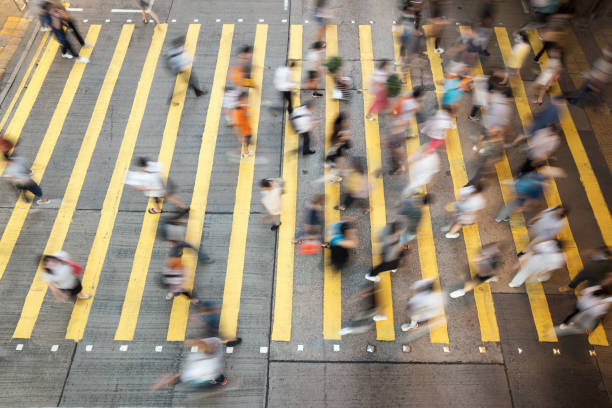 Busy pedestrian crossing in the city stock photo