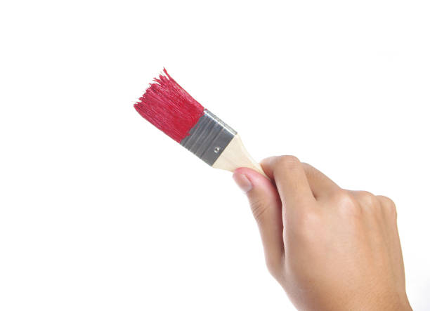istock Painting with red brush 1969443487