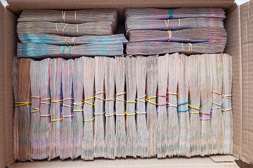 A large number of bundles of Ukrainian paper bills.
